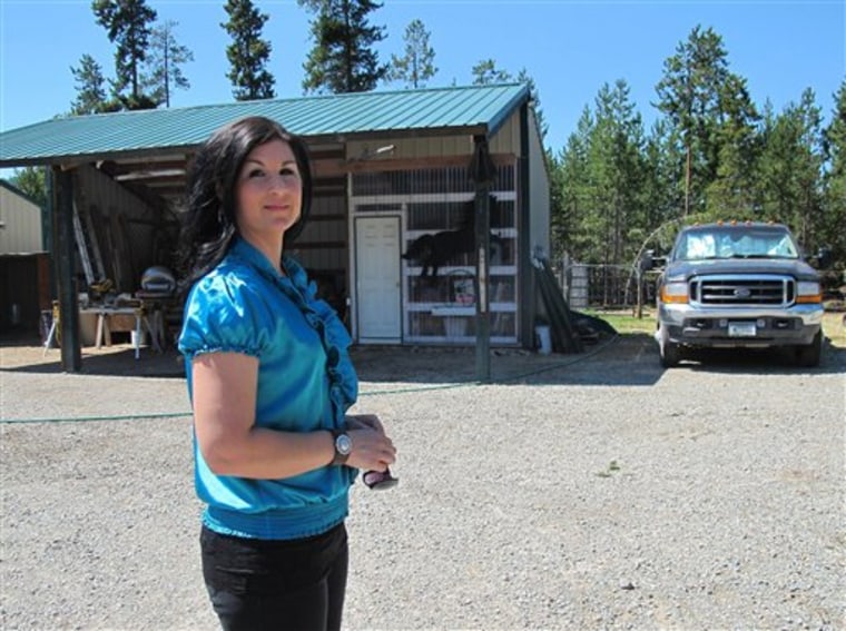 Sara Weaver stands outside her horse ranch near Kalispell, Mont. Weaver has finally forgiven the federal agents who 20 years ago shot her mother and younger brother to death during the siege at Idaho's Ruby Ridge. 